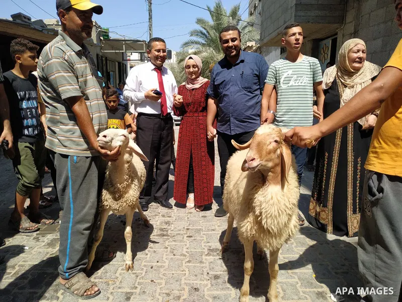 A Palestinian high school female student, lama Zaqot, 99.7%, celebrates with her family after heard the results of her final exams known as ''Tawjihi'', in Khan Younis in the southern of Gaza strip on August 3, 2021. Pho...