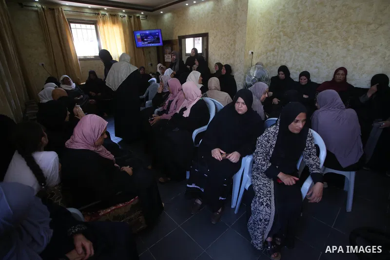 Mourners attend the funeral of Palestinian Mohammad Fareed Hasan, who was killed by Israeli gunfire, in the village of Qusra near the city Nablus on August 4, 2021, after Israel handed over his body today. A Palestinian...