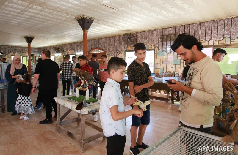 Palestinians attend a pet exhibition during the third day of Eid al-Adha festival celebrated by Muslims worldwide, in Gaza City on July 22, 2021. The al-Adha, or "Feast of Sacrifice", marks the end of the annual pilgrima...