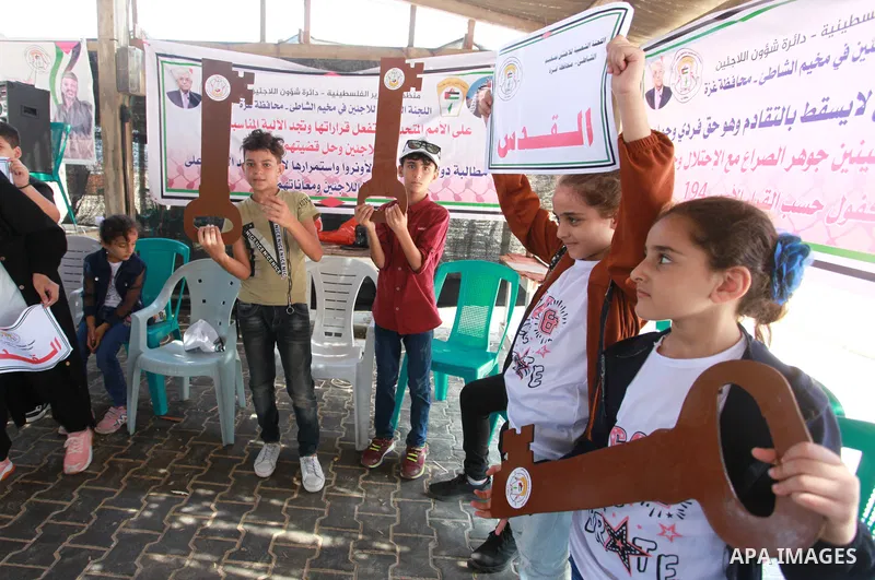 Palestinian refugee children take part in a mental health support session during entertainment festival after the latest Israeli escalation, in Gaza city, on July 24, 2021. Photo by Youssef Abu Watfa