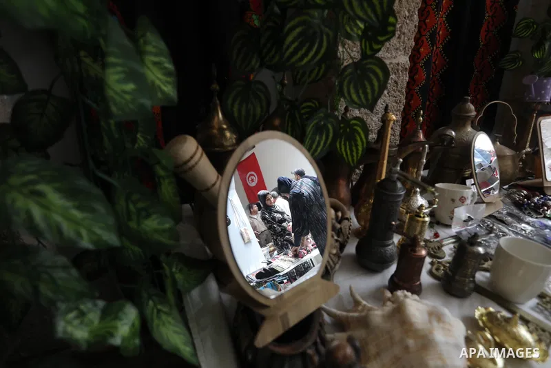 Palestinians attend an exhibition entitled "Our Heritage, Our Identity" marking the Palestinian traditional customs day, in Gaza City, on July 25, 2021. Palestinian costumes are the traditional clothing worn by Palestini...