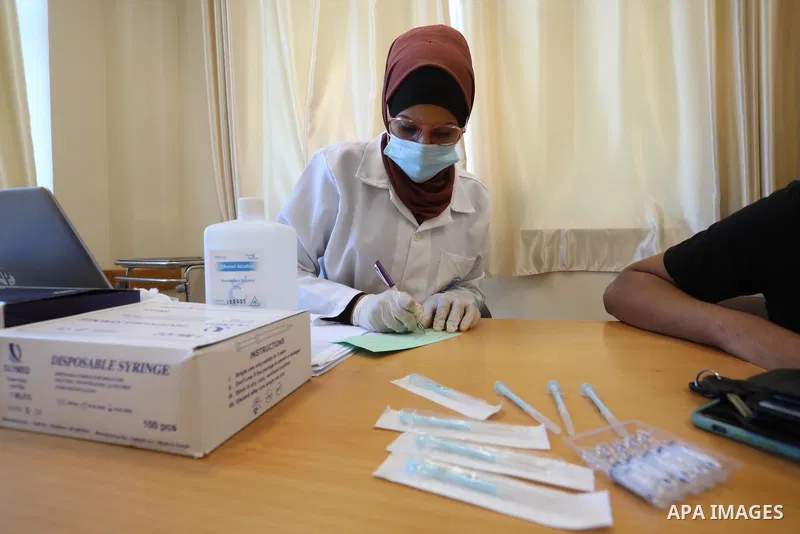 Palestinians receive the dose of the coronavirus disease (COVID-19) vaccine at the UNRWA clininc, in Gaza city on July 27, 2021. A total of 477,027 people have been vaccinated against the coronavirus in the West Bank and...