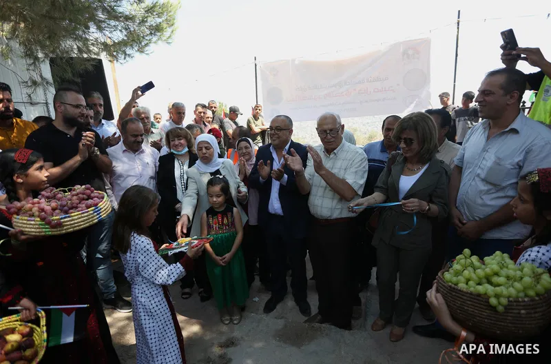 Palestinians take part on the opening day of the Beita market, in the West Bank village of Beita, near Nablus on July 27, 2021. The Palestinian ministry of culture launched the first market of the Cultural Capital Market...