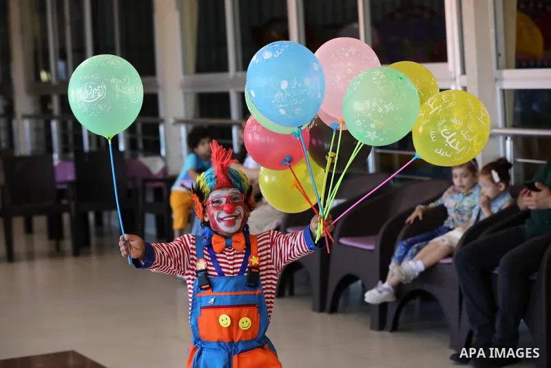 Palestinian children who their relatives killed by Israeli airstrikes during the recent conflict between Israel and Hamas attend a fun day, in Gaza City, on July 28, 2021. The Gaza Strip remains in ruins two months after...