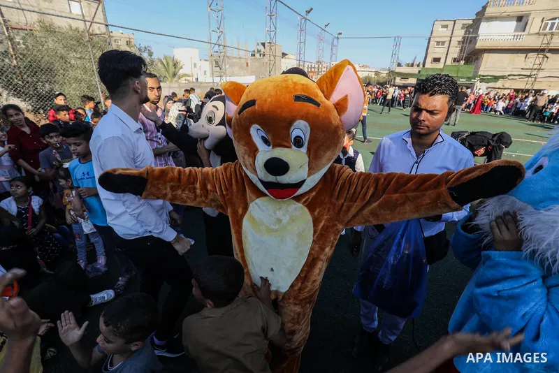 Palestinian children participate in a mental health support session during entertainment festival after the latest Israeli escalation, in Rafah in the southern Gaza Strip, on June 25, 2021. Photo by Abed Deeb