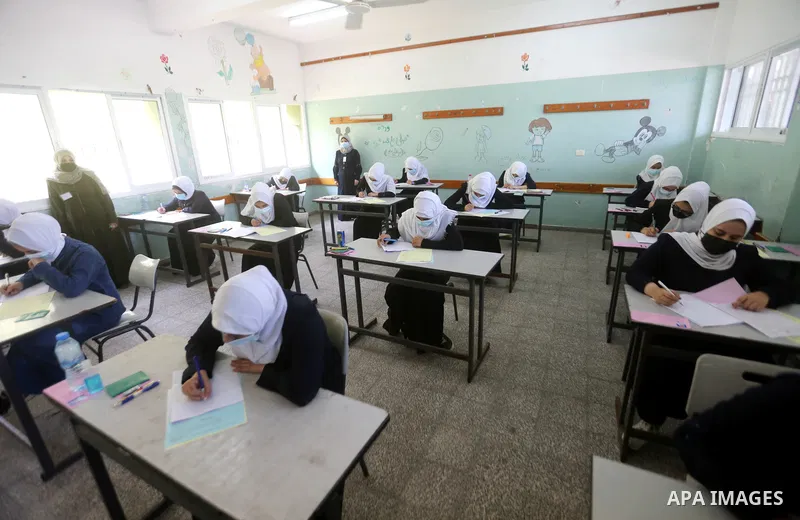 Palestinian students sit for their final high school exams, known as "Tawjihi" in Gaza city on June 24, 2021, amid concerns about the spread of the novel coronavirus pandemic. More than 84598 students in the West Bank an...