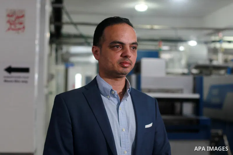 Palestinian Hamam Al-Yazeji, a director of Gaza Pepsi factory for soft drinks, stands at the factory, in Gaza's industrial zone on June 21, 2021. Pepsi factory announced today that it was closing and laying off workers b...