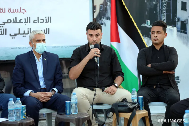 Palestinian journalists take part during discussion session on media performance during the recent Israeli military escalation, as a part of "Witness to the crime" exhibition, in Gaza city on June 10, 2021. Photo by Stri...