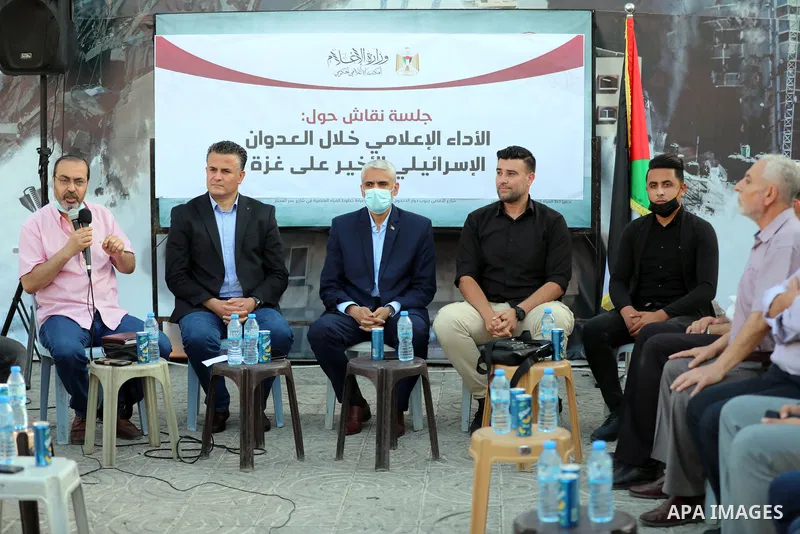 Palestinian journalists take part during discussion session on media performance during the recent Israeli military escalation, as a part of "Witness to the crime" exhibition, in Gaza city on June 10, 2021. Photo by Stri...