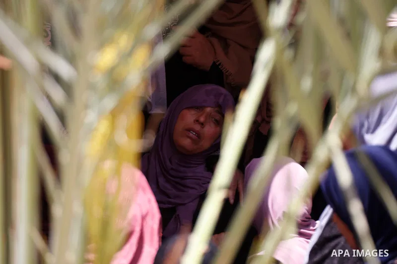 Relatives react during the funeral of Palestinian security man Tayseer Issa, who was killed by Israeli forces according to health ministry in the Werst bank city of Jenin, on June 10, 2021. Photo by Oday Daibes