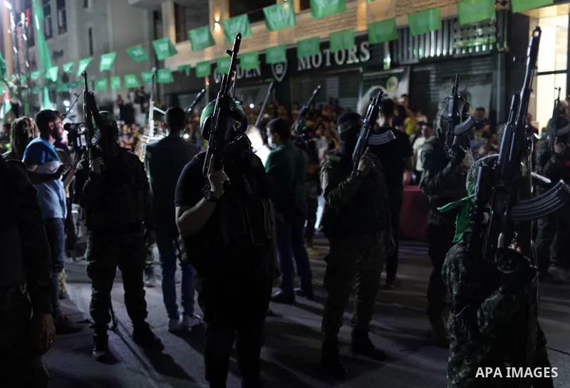 Palestinian supporters of Hamas movement take part in an anti-Israel rally in Gaza city, on June 9, 2021. The Egyptian-brokered truce ended 11 days of heavy Israeli bombing of Gaza and rocket fire from the impoverished c...