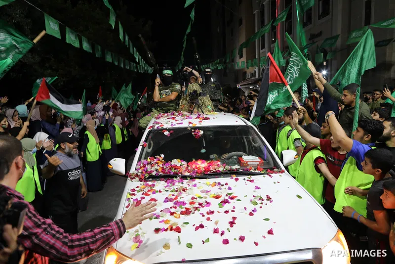 Palestinian supporters of Hamas movement take part in an anti-Israel rally in Gaza city, on June 9, 2021. The Egyptian-brokered truce ended 11 days of heavy Israeli bombing of Gaza and rocket fire from the impoverished c...
