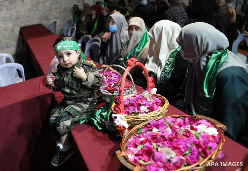 Palestinian supporters of Hamas movement take part in an anti-Israel rally in Gaza city, on June 9, 2021. The Egyptian-brokered truce ended 11 days of heavy Israeli bombing of Gaza and rocket fire from the impoverished c...