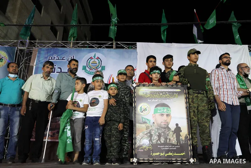 Palestinian supporters of Hamas movement take part in an anti-Israel rally in Gaza city, on June 9, 2021. The Egyptian-brokered truce ended 11 days of heavy Israeli bombing of Gaza and rocket fire from the impoverished c...