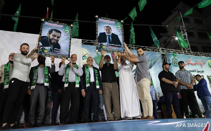 Palestinian supporters of Hamas movement take part in an anti-Israel rally in Gaza city, on June 9, 2021. The Egyptian-brokered truce ended 11 days of heavy Israeli bombing of Gaza and rocket fire from the impoverished c...