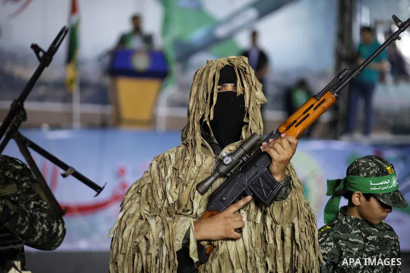 Palestinian supporters of Hamas movement take part in an anti-Israel rally in Gaza city, on June 9, 2021. The Egyptian-brokered truce ended 11 days of heavy Israeli bombing of Gaza and rocket fire from the impoverished c...