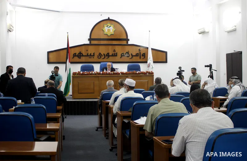 Palestinian Members of Legislative Council, attend a meeting at the legislative council, in Gaza city on June 9, 2021. Palestinians mark "Naksa Day" to mourn the 54th anniversary of Israel's occupation of the West Bank a...