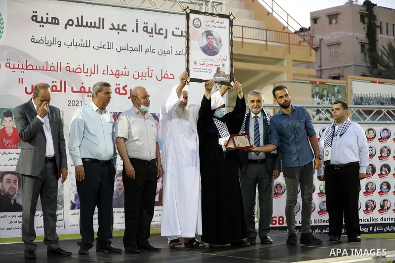 Palestinians attend a honor ceremony for athletes who killed by Israeli airstrikes during the latest Israeli military escalation last month, in Gaza city on June 8, 2021. Israeli air strikes and artillery fire on Gaza ki...