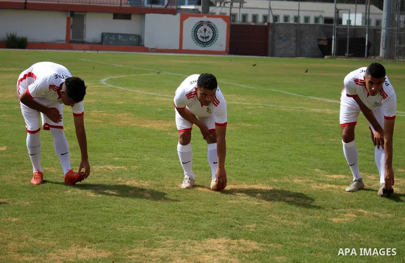Palestinian Olympic Team Players, take part in training exercises in a Palestine stadium in Gaza City on June 8, 2021. Palestine first competed at the Summer Olympics, in 1996. The Palestinian National Authority is repre...