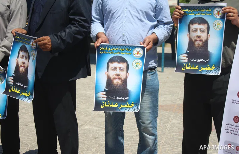 Palestinians take part in a solidarity with leader of Islamic Jihad Khader Adnan, in Gaza city, on June 7, 2021. Political prisoner held by Israel, Khader Adnan, 43, has declared a hunger strike the day he was abducted b...