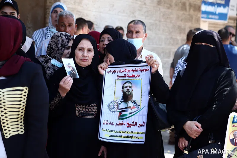 Palestinians take part in a protest to show solidarity with prisoners on Israeli Jails, in front of the headquarters of Red cross, in Gaza City on June 7, 2021. Some 4,650 Palestinian prisoners were being held in the Isr...