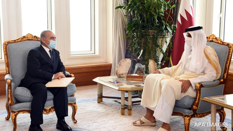 Palestinian Prime Minister Mohammad Ishtayeh meets with Qatar's ruler Emir Sheikh Tamim bin Hamad Al-Thani, in the Qatari capital, Doha on June 7, 2021. Photo by Prime Minister Office
