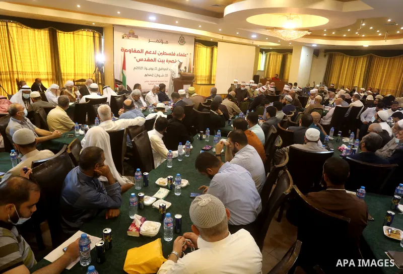 Members of the Palestine Scholars Association, attend a conference in support of at the Al-Aqsa Mosque, in Gaza city, June 2, 2021. The escalation, which began after Israeli security forces banned Palestinians from acces...