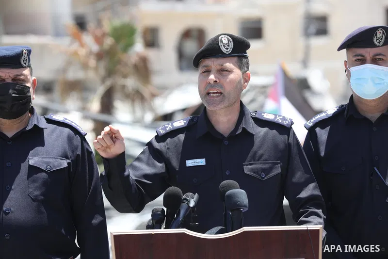 The commander of the police in the Gaza Strip, Mahmoud Salah, speaks during a press conference on the rubble of Arafat City, Gaza's police headquarters on May 22, 2021, following a ceasefire between Israel and Hamas movm...