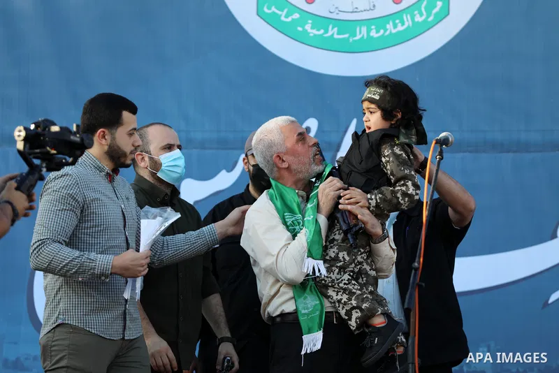 Yahya Sinwar, leader of the Palestinian Hamas movement, greets supporters during a rally in Gaza City on May 24, 2021. A ceasefire was reached late last week after 11 days of deadly violence between Israel and the Hamas...