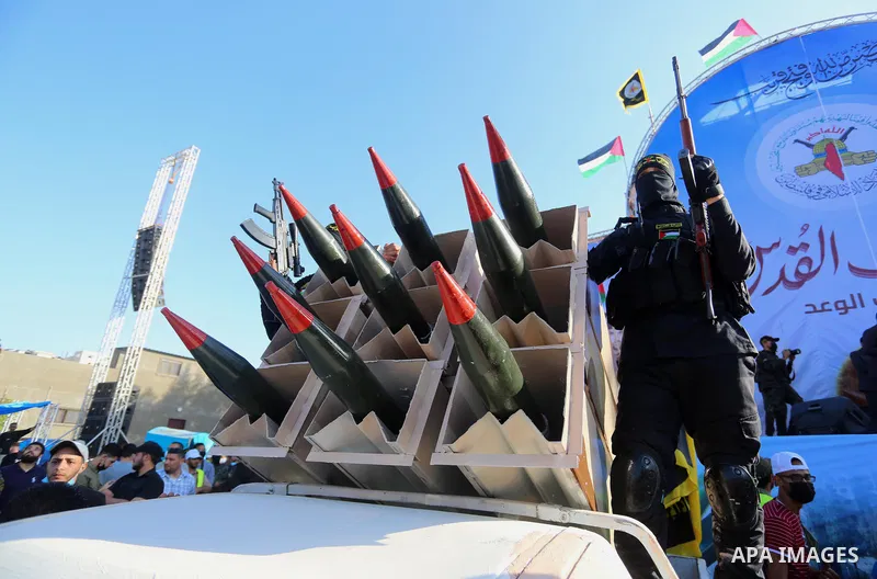 Fighters of al-Quds Brigades, the armed wing of the Palestinian Islamic Jihad movement, parade with their weapons in the streets of Gaza City during a rally, on May 29, 2021, more than a week after a ceasefire brought an...