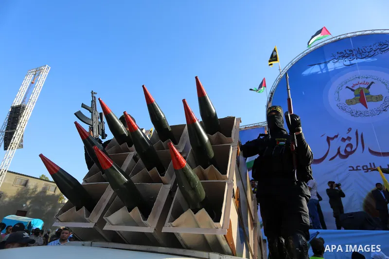 Fighters of al-Quds Brigades, the armed wing of the Palestinian Islamic Jihad movement, parade with their weapons in the streets of Gaza City during a rally, on May 29, 2021, more than a week after a ceasefire brought an...