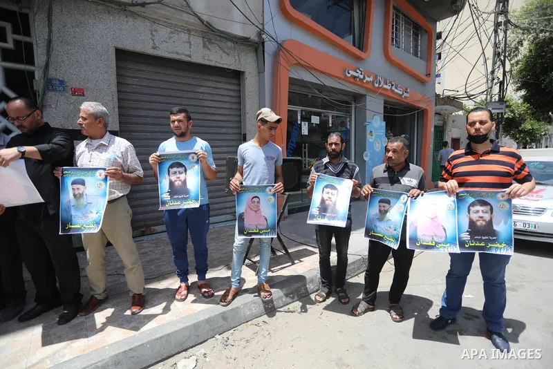 Palestinians take part in a solidarity with leader of Islamic Jihad Khader Adnan, in Gaza city, on May 30, 2021. Israeli forces detained a senior leader of Islamic Jihad in the occupied West Bank, according to his wife o...