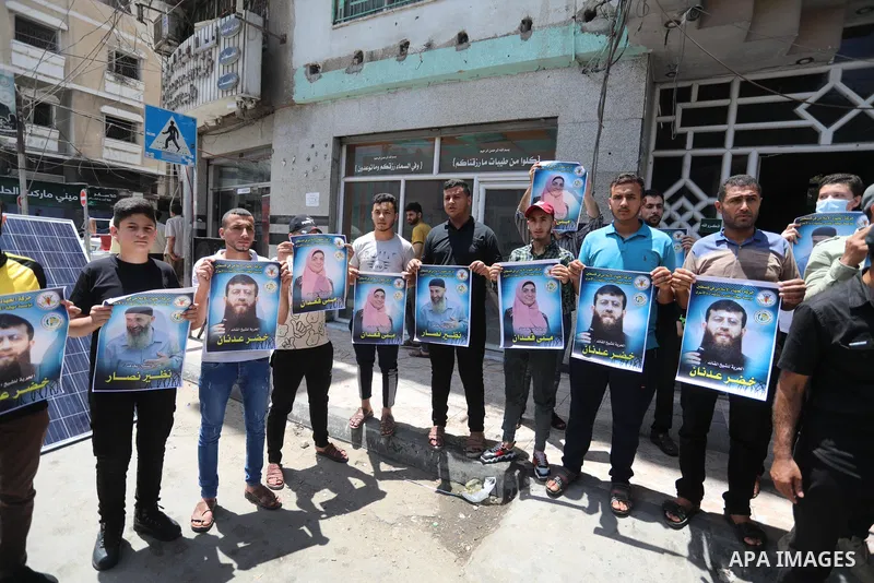Palestinians take part in a solidarity with leader of Islamic Jihad Khader Adnan, in Gaza city, on May 30, 2021. Israeli forces detained a senior leader of Islamic Jihad in the occupied West Bank, according to his wife o...
