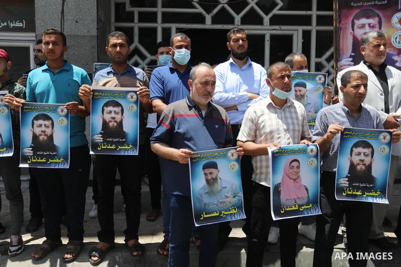 Palestinians take part in a solidarity with leader of Islamic Jihad Khader Adnan, in Gaza city, on May 30, 2021. Israeli forces detained a senior leader of Islamic Jihad in the occupied West Bank, according to his wife o...