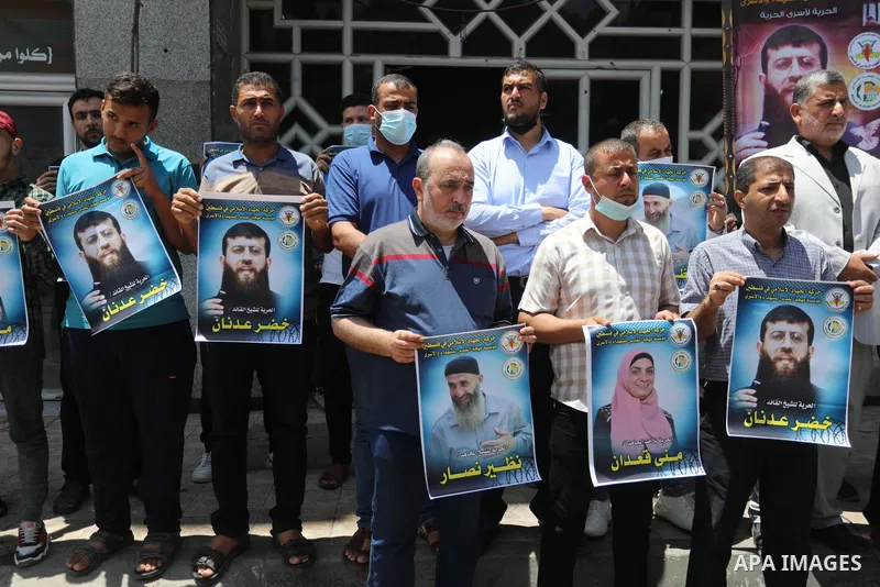 Palestinians take part in a solidarity with leader of Islamic Jihad Khader Adnan, in Gaza city, on May 30, 2021. Israeli forces detained a senior leader of Islamic Jihad in the occupied West Bank, according to his wife o...