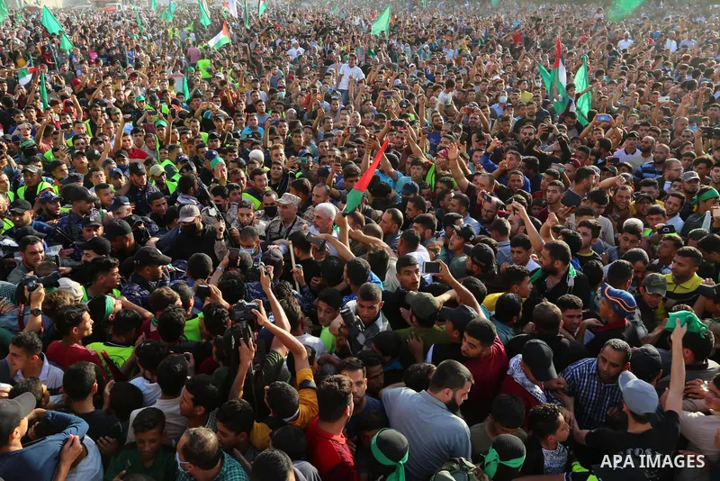 Yahya Sinwar, leader of the Palestinian Hamas movement's political wing, greets supporters in an anti-Israel rally in Beit Lahia in the northern Gaza Strip, May 30, 2021. Photo by Ashraf Amra