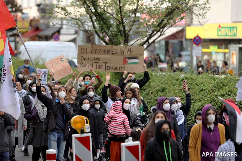 Palestinians and foreign activists take part in a protest in solidarity the Palestinians in Gaza strip and Jerusalem's Sheikh Jarrah neighbourhood, in Berlin moves along the Kottbusser Tor, Germany, on May 14, 2021. More...