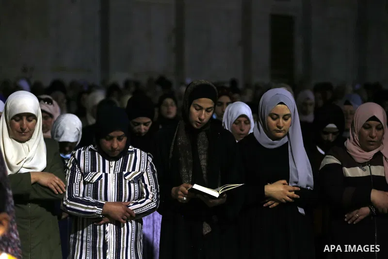 Palestinians pray on Laylat al-Qadr during the holy month of Ramadan, at the compound that houses Al-Aqsa Mosque, known to Muslims as Noble Sanctuary and to Jews as Temple Mount, in Jerusalem's Old City, May 8, 2021. Pho...