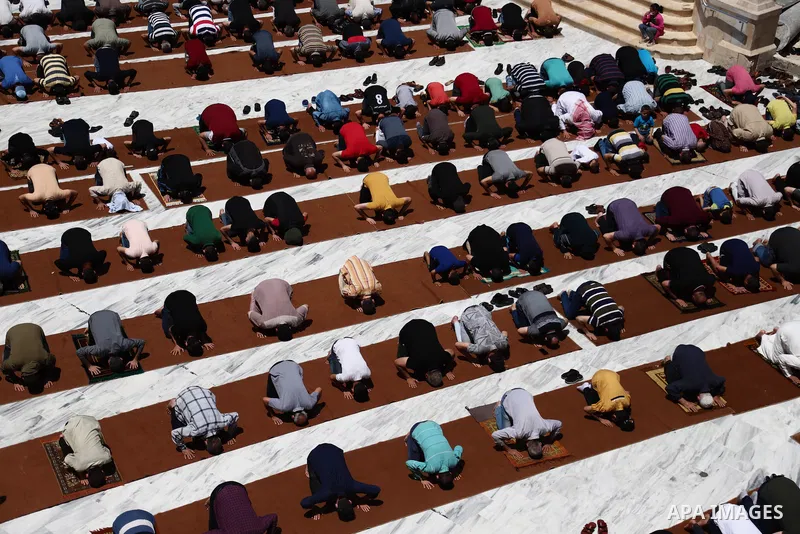 Palestinian Muslims pray on the last Friday of Ramadan at al-Omari mousque in Gaza city amid the COVID-19 pandemic on May 07, 2021. Photo by Mahmoud Ajjour