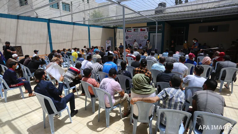 Deir Al-Balah Zakat Committee hold a press conference to announce the release of 84 Palestinian prisoners who are indebted in Jails in Deir al-Balah in the center of Gaza Strip, run by the Ministry of the Interior and Na...