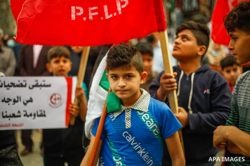 Palestinian supporters of the Popular Front for the Liberation of Palestine, take part in a protest in support of the Al-Aqsa Mosque in Jabalia camp, northern Gaza Strip, on April 24, 2021. The Jerusalem uprising, as it...