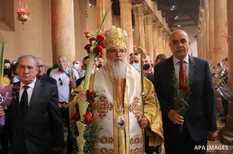 Archbishop Theophylactos of Jordan, the Greek Orthodox Patriarchal Representative in Bethlehem, attends Palm Sunday celebrations at the Church of the Nativity in the biblical city of Bethlehem in the occupied West Bank o...