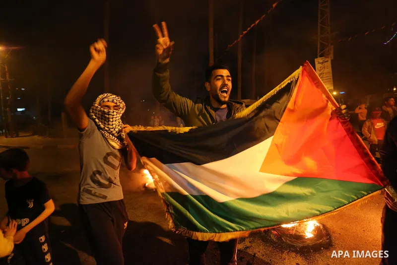 Palestinians take part during a rally in support of at the Al-Aqsa Mosque, in Deir Al-Balah, in middle of Gaza Strip, on April 24, 2021. Raged last night in occupied Jerusalem for the 11th night in a row in protest again...