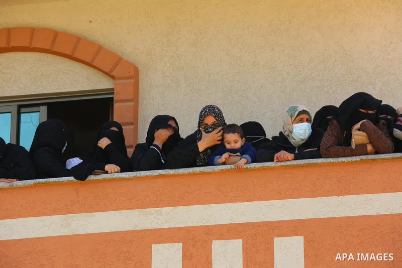 Relatives of the Palestinian Yousef Abu Jazar, mourn during his funeral, in Rafah in the southern of Gaza strip, on April 25, 2021. On Thursday, the Israeli occupation authorities delivered the body of the Palestinian ch...