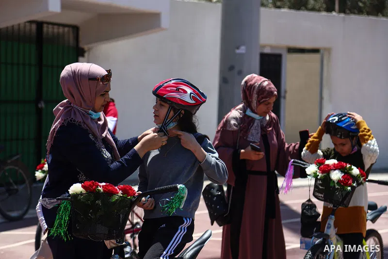 Palestinian women participate in cycling, "breathe deeply" at the Yarmouk stadium in Gaza City, on April 27, 2021. The "pink bike" project provides women and girls in the Gaza Strip the opportunity to ride bicycles in pr...