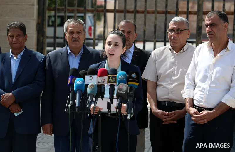 Palestinian candidates from Future List, attend a press conference against postponement of the Palestinian parliamentary and presidential elections, calling for holding elections on planned date in Gaza city on April 30,...