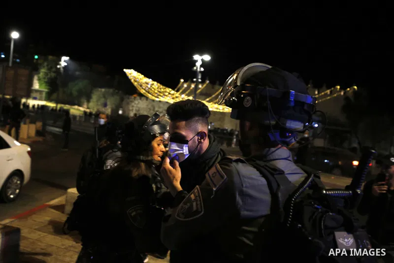 Israeli security forces detain a Palestinian man during clashes at Damascus Gate just outside Jerusalem's Old City, Thursday, April. 22, 2021. Palestinians clashed with Israeli police over restrictions on Ramadan gatheri...