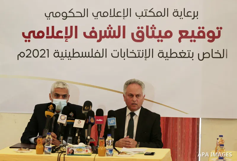 A delegation from the Palestinian central elections commissions in the Gaza Strip attend the ceremony of Media Ethics Charter, in Gaza City on April 12, 2021. Palestinian Central Elections Commissions (CEC) published rec...