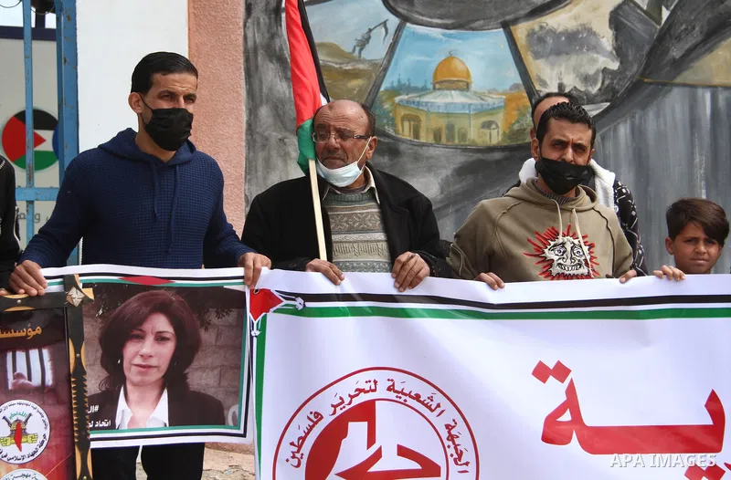 Palestinian of the Popular Front for the Liberation of Palestine and the Islamic Jihad Movement, take part in a protest to solidarity prisoners in Israeli jails on Palestinian Prisoners' Day, in front of Erez crossing, i...