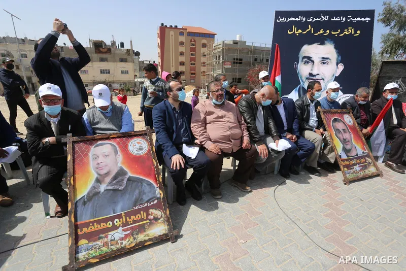 Palestinians take part in the press conference to announce the activities of the National Day of the Palestinian Prisoners' Day entitled (born free), in front of the house of the Palestinian Prisoner, Leader Hassan Salam...